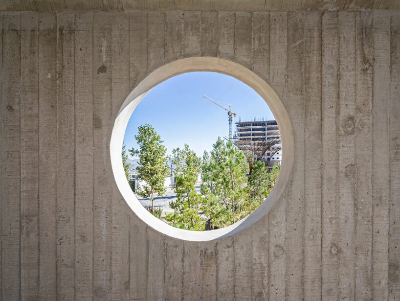 house-like concrete play structures frame community arc park in chihuahua - 7