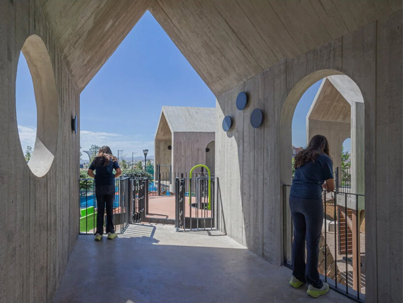 house-like concrete play structures frame community arc park in chihuahua - 8