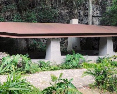 atelier guo frames yangshuo’s mountain landscape beneath a sweeping roof