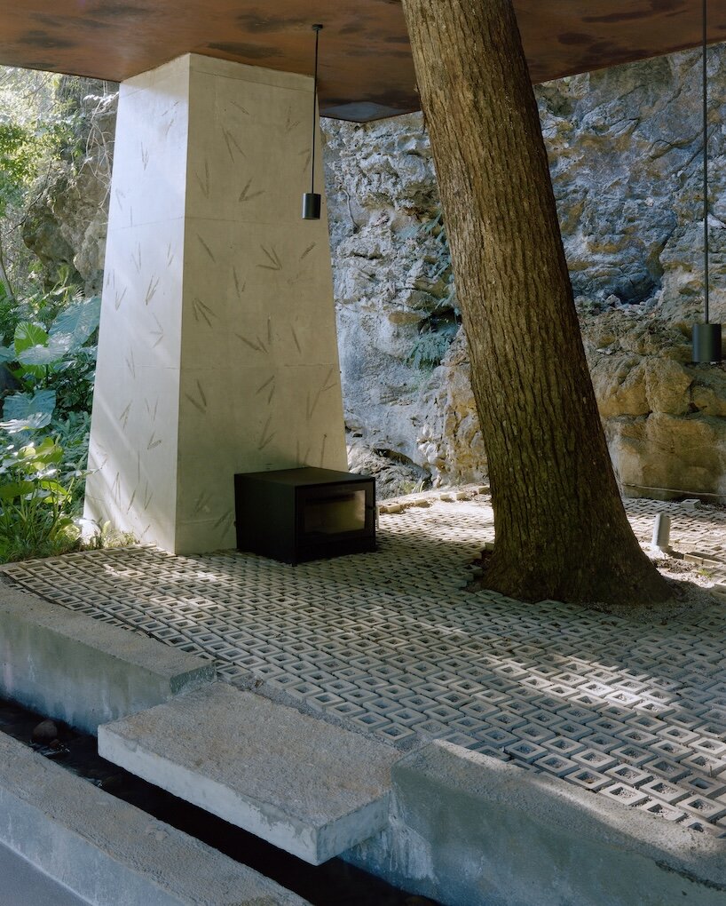 atelier guo frames yangshuo’s mountain landscape beneath a sweeping roof - 12
