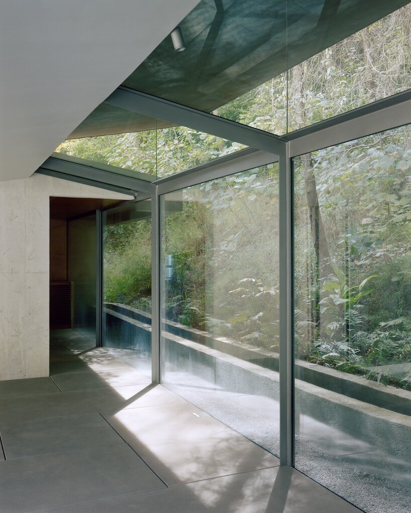 atelier guo frames yangshuo’s mountain landscape beneath a sweeping roof - 9