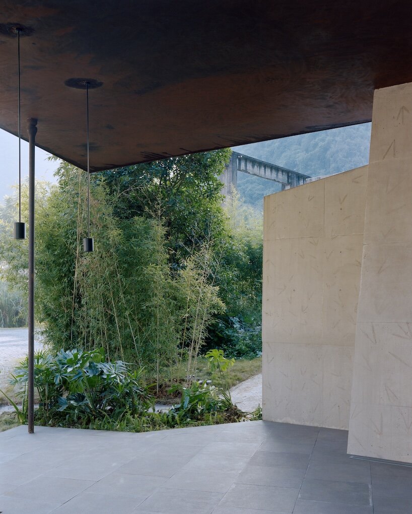 atelier guo frames yangshuo’s mountain landscape beneath a sweeping roof - 6