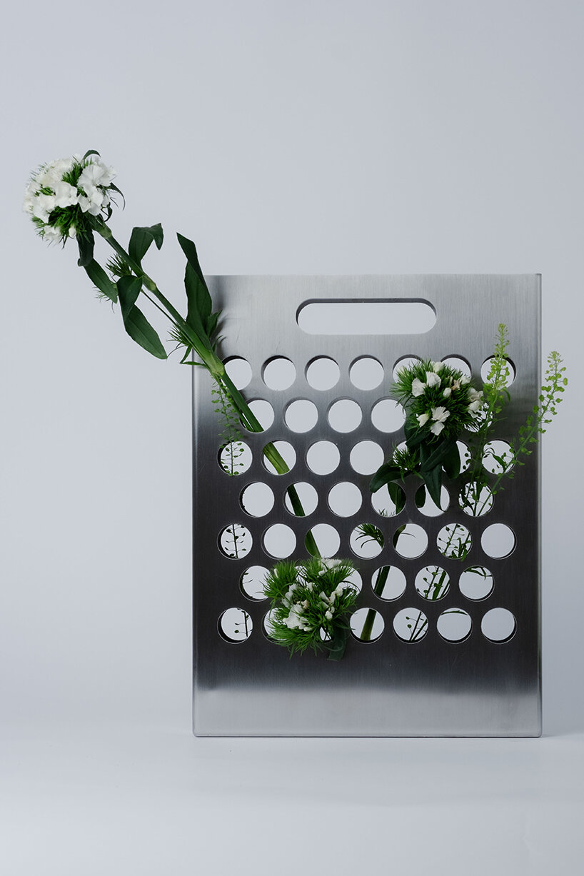 ole müller gives flowers room to spread with bag-like stainless steel vase - 3