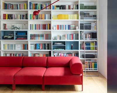 blue portals and brick vaults shape DKA's apartment renovation in rome