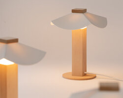 byunggwon na’s ALIT lamp balances ceramic, wood and light in one quiet composition