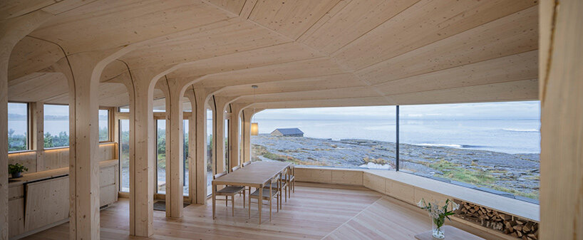 helen & hard revives viking boatbuilding with whole-tree cabin on norway’s atlantic coast