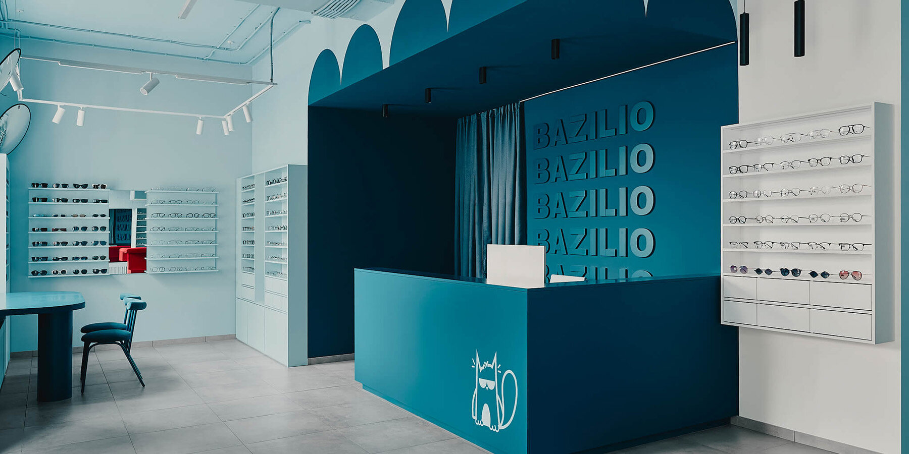 hubarch-wraps-an-optics-boutique-in-cold-blue-with-single-red-interruption-1-6a8747b849aeb