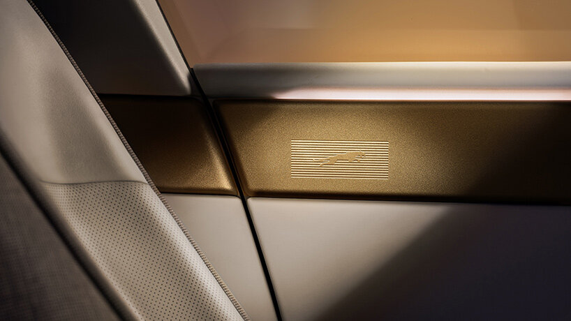 jaguar reveals type 01 interior with full-length 'spine' and travertine tones - 1