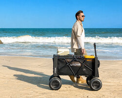 foldable aluminum beach wagon integrates electric propulsion for soft-sand mobility