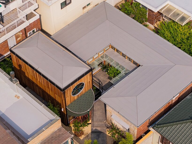 1968 seoul residence is reshaped with courtyard, annex and timber frame - 1