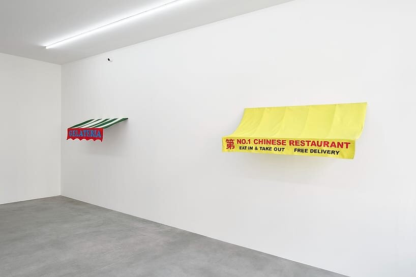 storefront canopies leave the streets behind to become sculptures of urban identity - 9