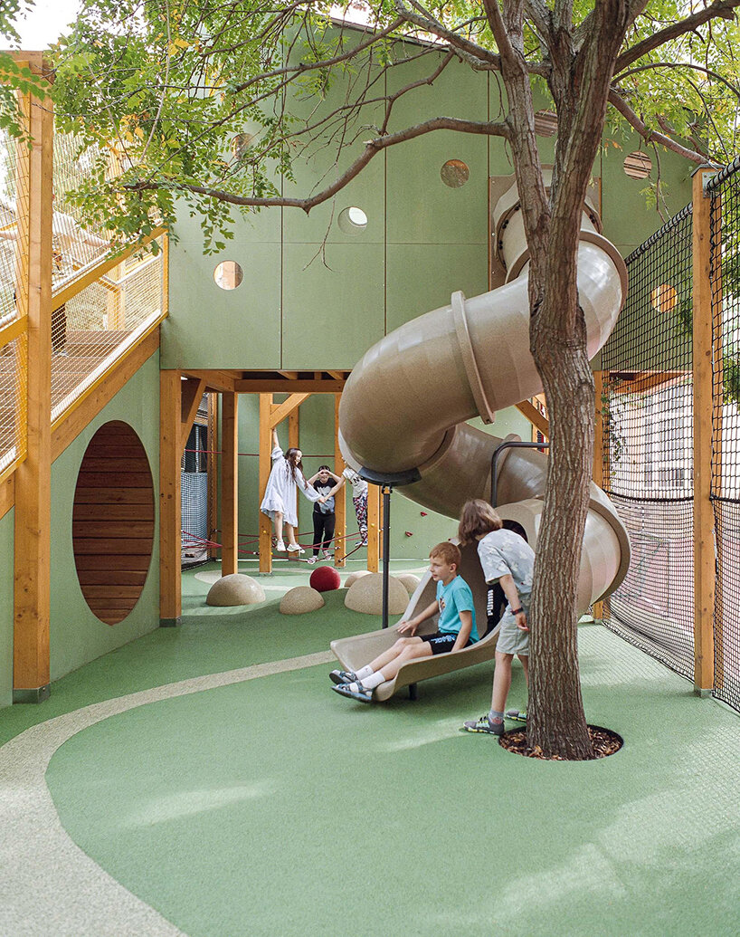 studio KRAFT reclaims limited schoolyard space with vertical play garden in budapest - 5