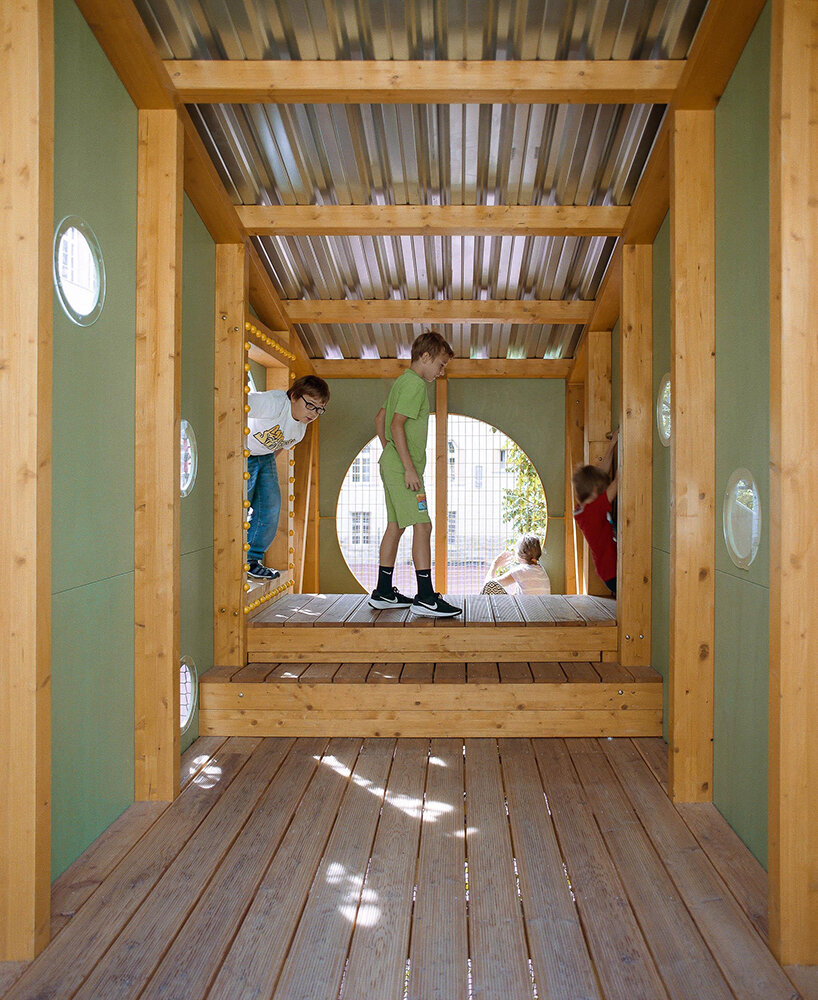 studio KRAFT reclaims limited schoolyard space with vertical play garden in budapest - 6