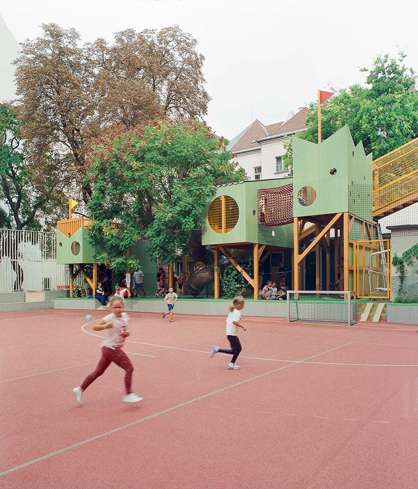 studio KRAFT reclaims limited schoolyard space with vertical play garden in budapest - 2