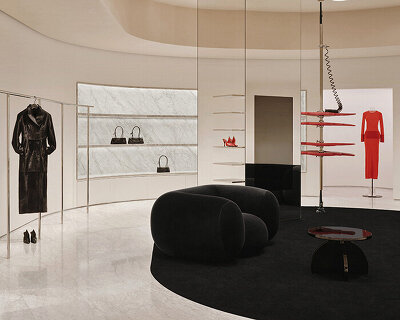 alaïa reopens shanghai boutique with perforated facade and curved interior