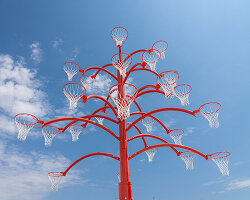 alexandre arrechea grows a playable tree of basketball hoops in toronto