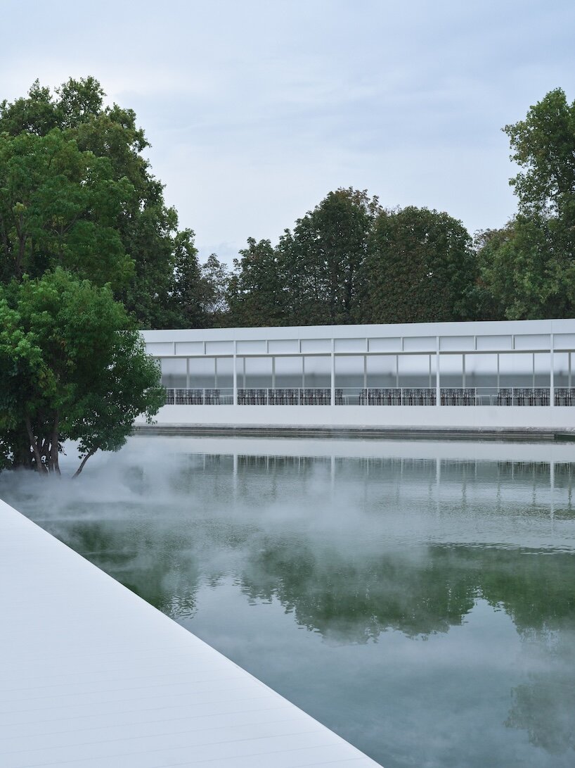 bureau betak places geometric white runway within mist-filled landscape for dior - 5