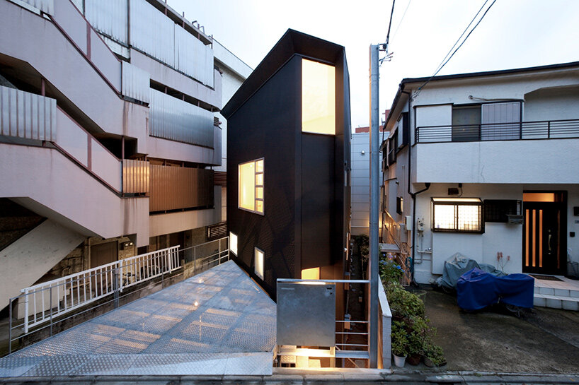 why japanese architects carve parking into tiny urban homes - 2