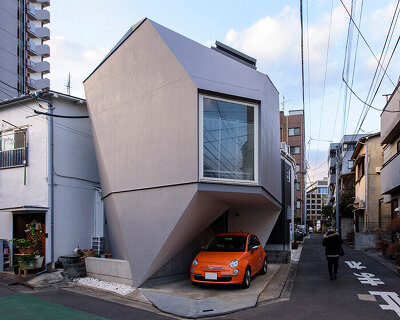 why japanese architects carve parking into tiny urban homes