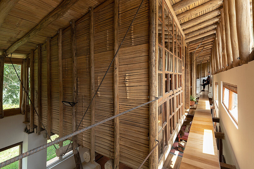 la cabina de la curiosidad suspends timber 'nests' beneath eucalyptus roof in ecuador - 5