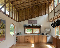 la cabina de la curiosidad suspends timber 'nests' beneath eucalyptus roof in ecuador