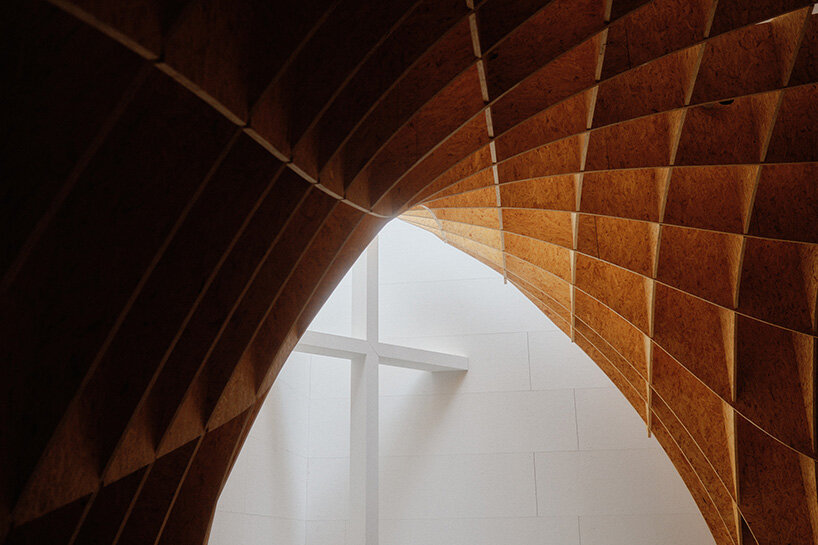 david altrath reveals the timber world inside germany's motorway chapel - 11