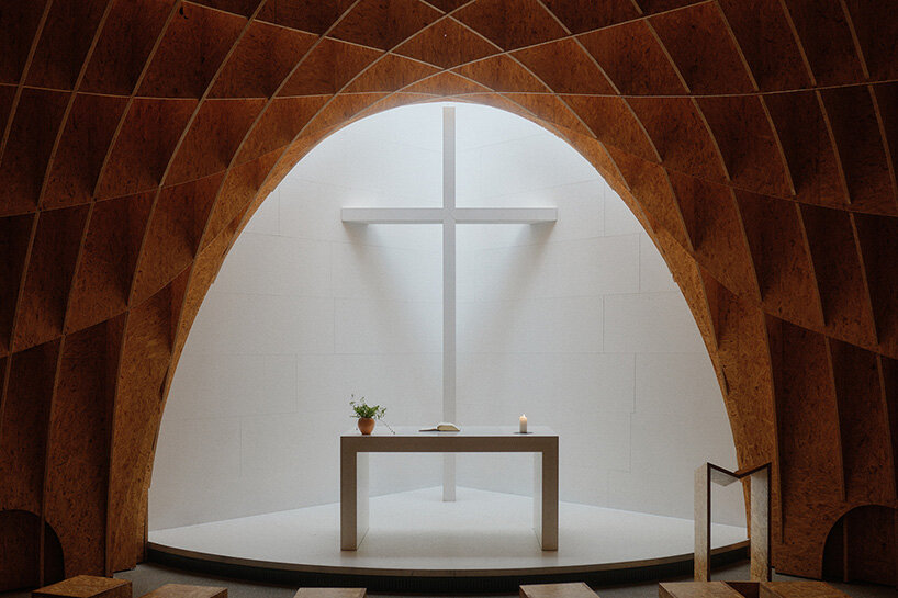 david altrath reveals the timber world inside germany's motorway chapel - 10