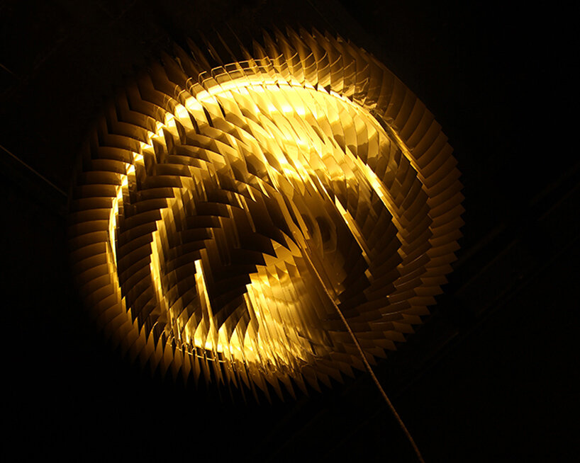 discarded aluminum blinds transform into cylindrical lighting system - 11