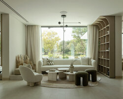 travertine, timber, and desert-toned textures shape groundeddesign’s villa limni in dubai