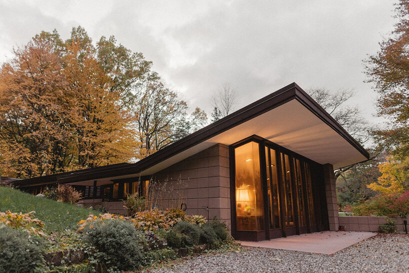 cantilevered roof extends over frank lloyd wright’s concrete usonian house, now listed - 2