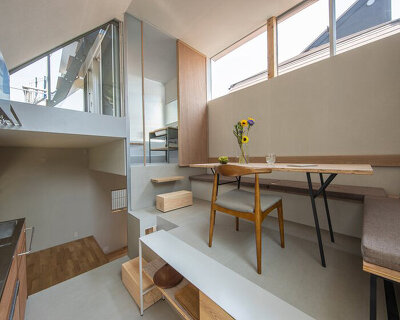 a spiral of timber beams and steel frames tiny 40-sqm tokyo home