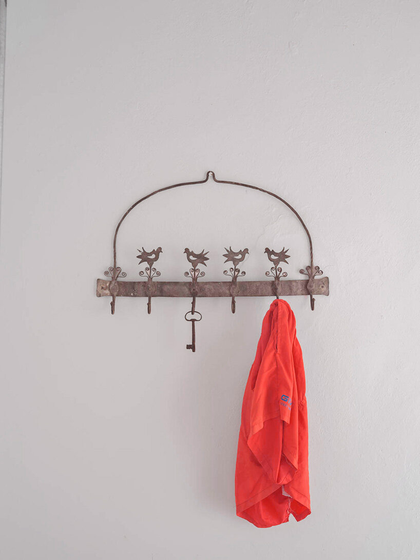 KOSMOS transforms mallorcan townhouse by giving old materials new roles - 11