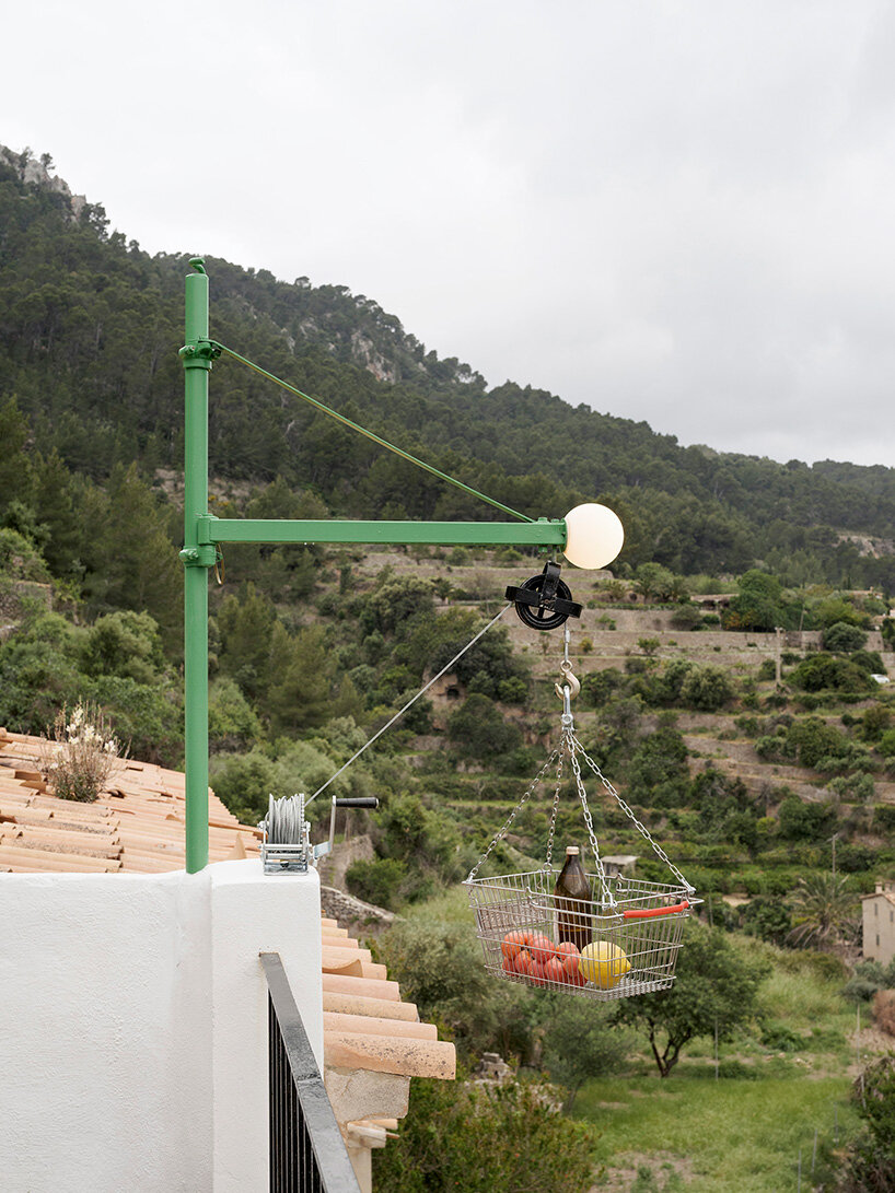 KOSMOS transforms mallorcan townhouse by giving old materials new roles - 16