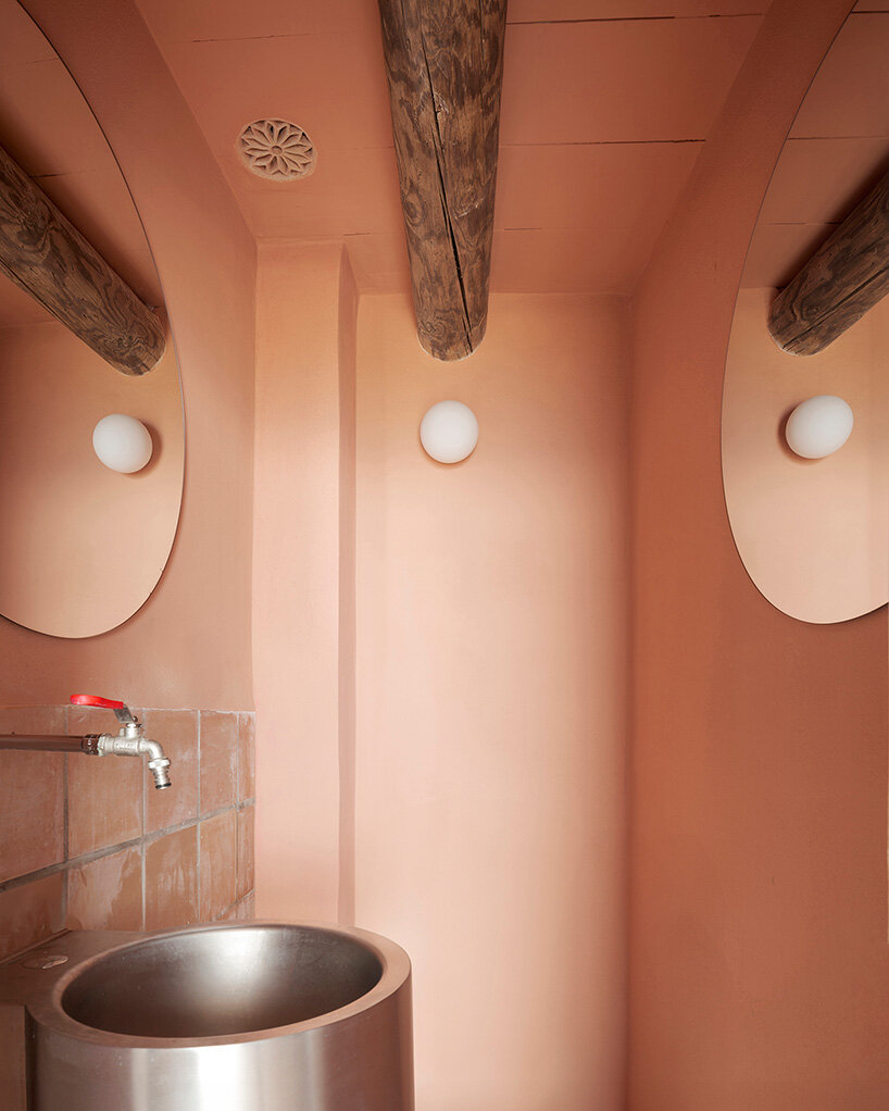 KOSMOS transforms mallorcan townhouse by giving old materials new roles - 17