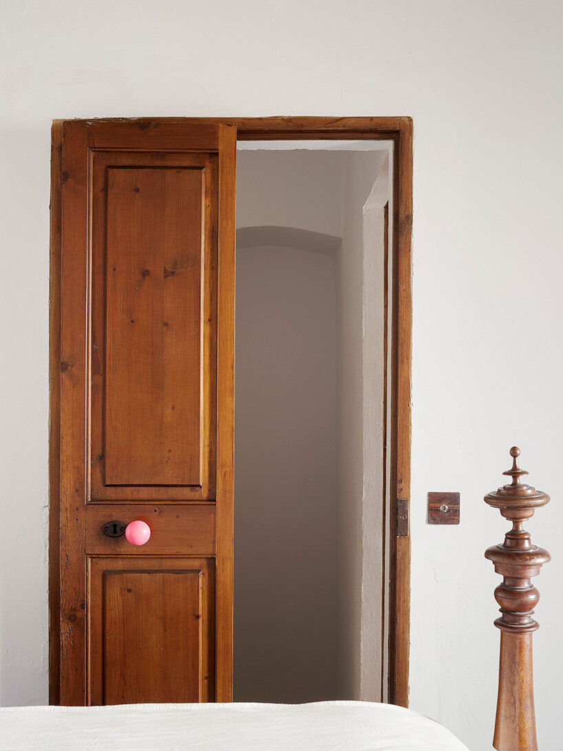 KOSMOS transforms mallorcan townhouse by giving old materials new roles - 8