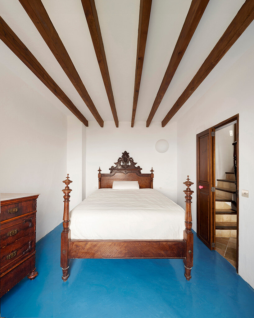 KOSMOS transforms mallorcan townhouse by giving old materials new roles - 9