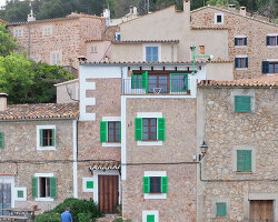 KOSMOS transforms mallorcan townhouse by giving old materials new roles