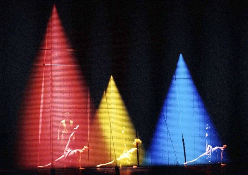three illuminated stage structures carry projected figures in a Laterna Magika performance