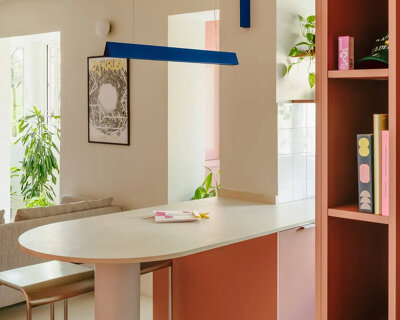 curved joinery and bold color reframe 1960s apartment in madrid