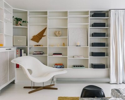 mirrors, ribbed glass, and light boxes open up a narrow amsterdam townhouse