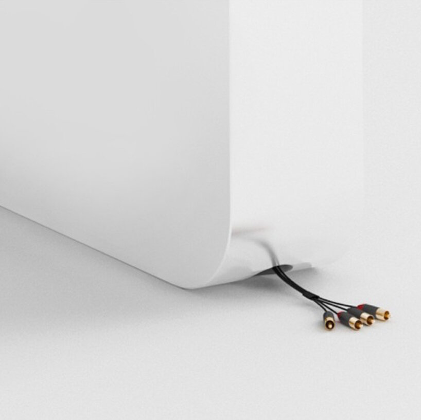 continuous white DJ console integrates turntables, mixers, and hidden cables - 6