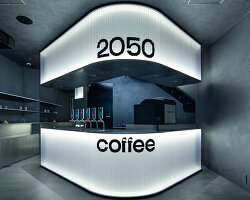 diagonal forms and illuminated curves outline 2050 coffee shop along osaka’s midosuji axis