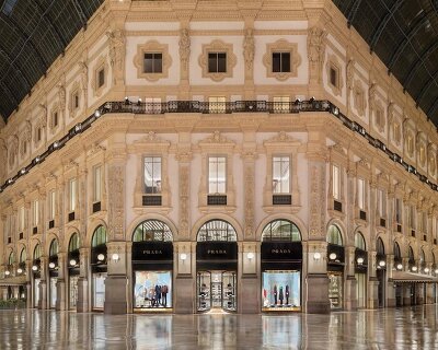prada galleria unfolds across eight floors of fashion, art, history and pastry in milan