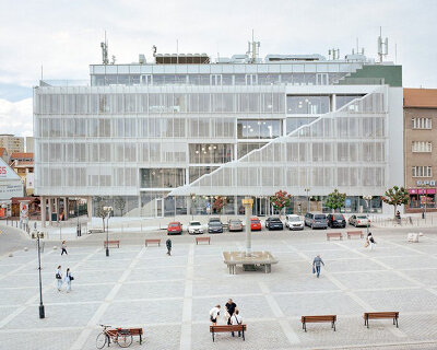 steel layered facade revives 1969 modernist city hall in czech republic