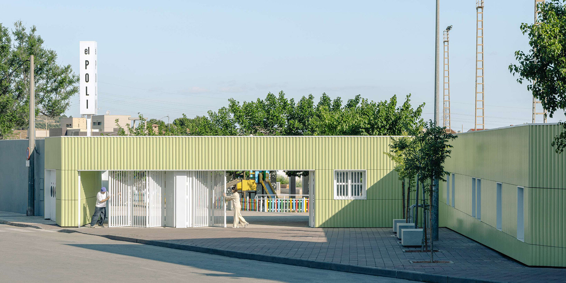 ribbed-lime-green-gateway-blue-solar-canopy-municipal-sports-center-spain-meii-estudio-designboom-1800-1