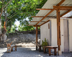 volunteer camp in thailand hand-builds school toilet from reclaimed wood