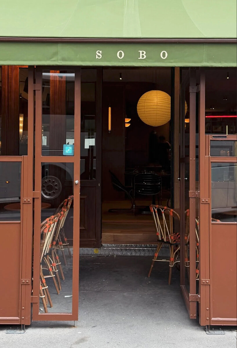 SOBO wraps paris listening restaurant in oak, vintage furniture, and acoustic panels - 1