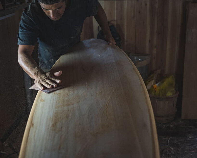 scars left by bears ripple through these japanese cedar surfboards - 1
