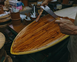 scars left by bears ripple through these japanese cedar surfboards
