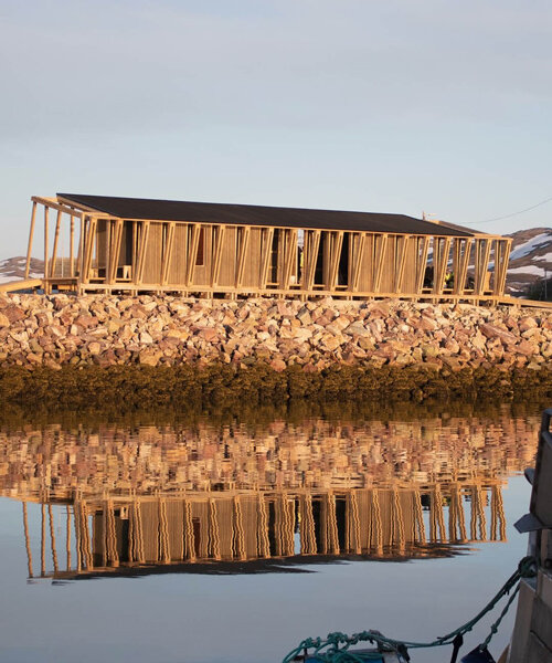 reclaimed timber frames shape skroget coastal sauna and community hub in norway